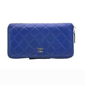 CHANEL Lambskin Quilted Large Gusset Zip Around Wallet in Blue